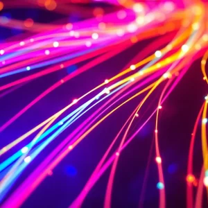 Vibrant fiber optic cables glowing in a digital landscape.